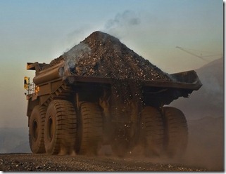 mining trucks and boom in australia